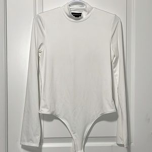 White turtle neck body suit